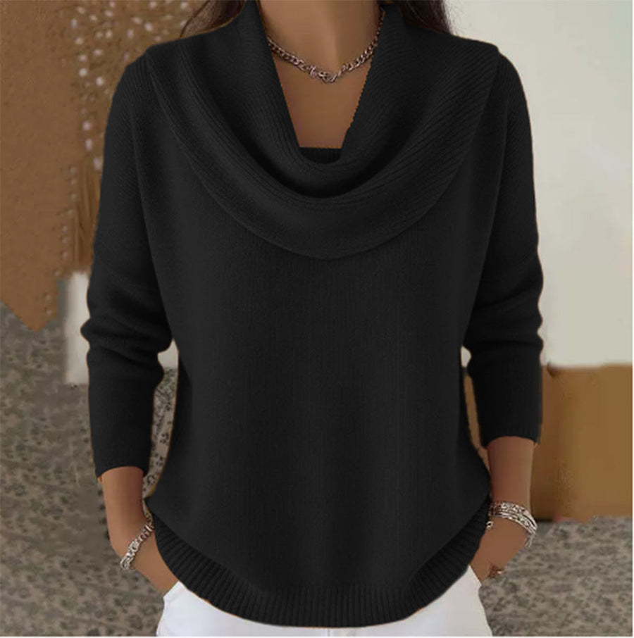 Black knit jumper with draped cowl collar and long sleeves, ribbed hem