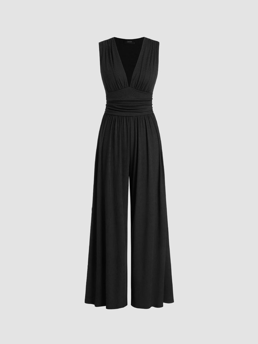 Black sleeveless wide-leg jumpsuit with V-neck, ruched bodice and gathered waist.