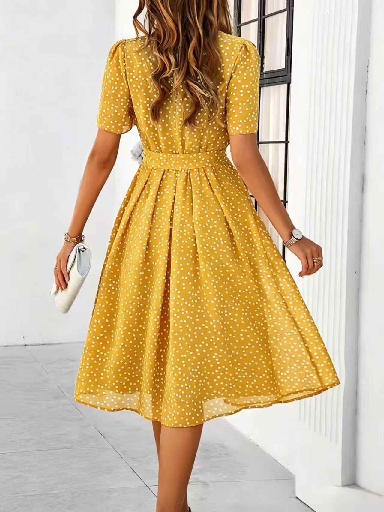 Yellow polka-dot dress with short sleeves and tie waist, flared midi skirt (back view)