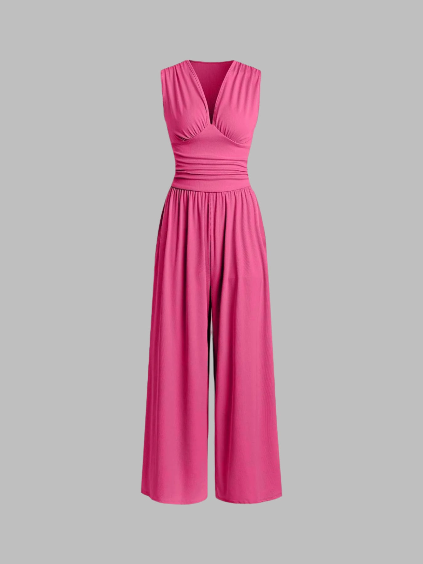 Rose red sleeveless wide-leg jumpsuit with V-neck, ruched bodice and gathered waist.