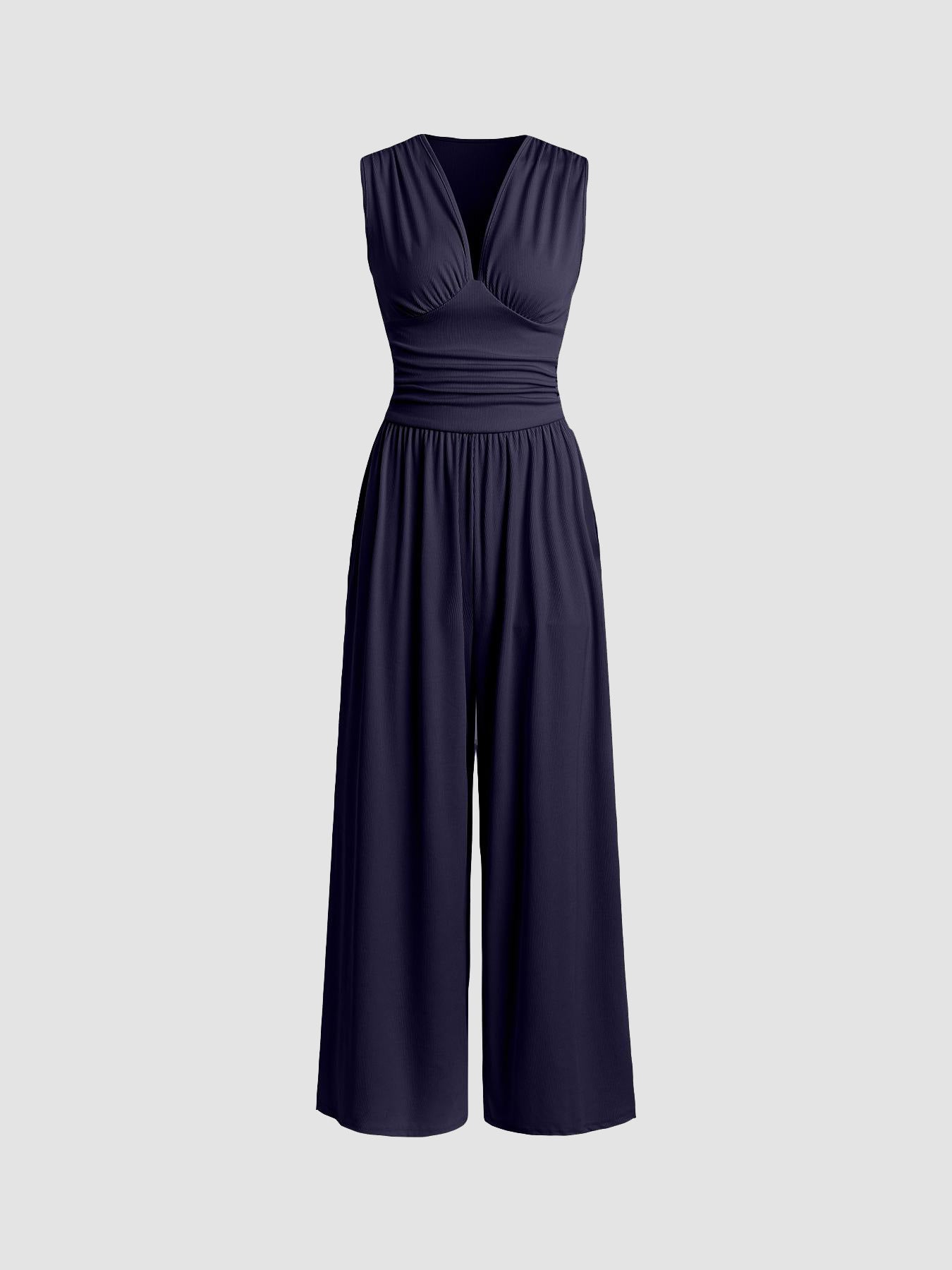 Navy sleeveless wide-leg jumpsuit with V-neck, ruched bodice and gathered waist.
