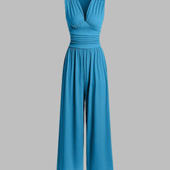 Blue sleeveless wide-leg jumpsuit with V-neck, ruched bodice and gathered waist.