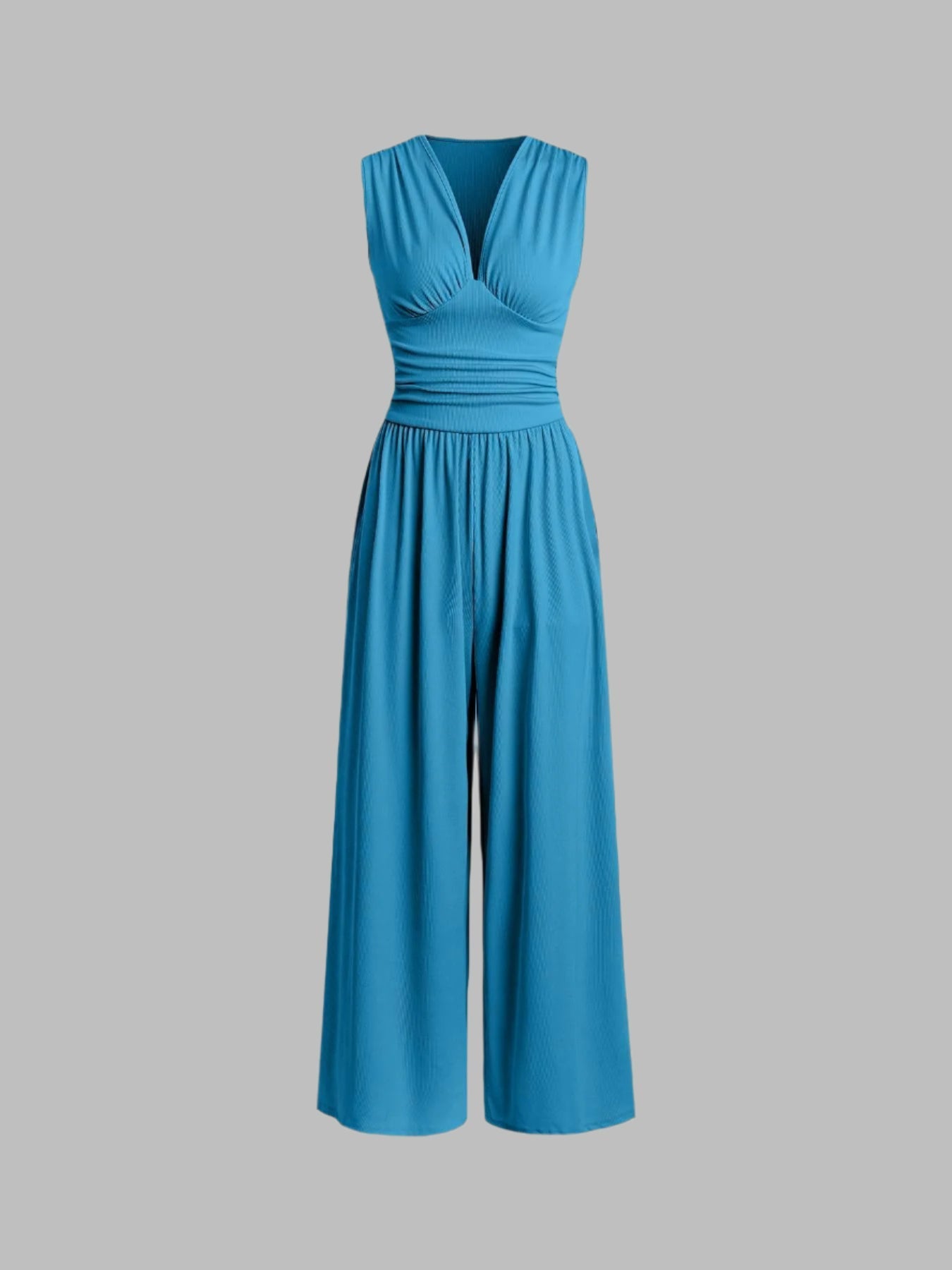 Blue sleeveless wide-leg jumpsuit with V-neck, ruched bodice and gathered waist.