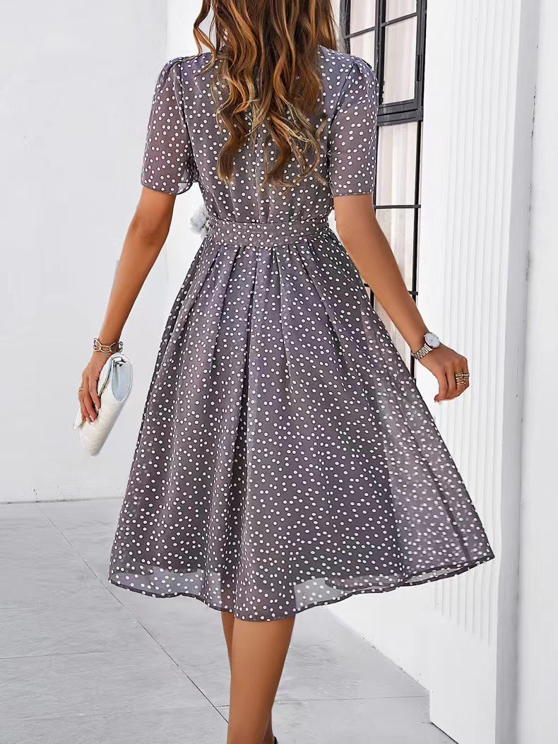 Gray polka-dot midi dress with short sleeves and gathered waist, full twirl skirt