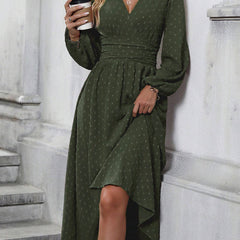 Military green dotted pleated lantern-sleeve dress with diagonal V neckline and asym hem