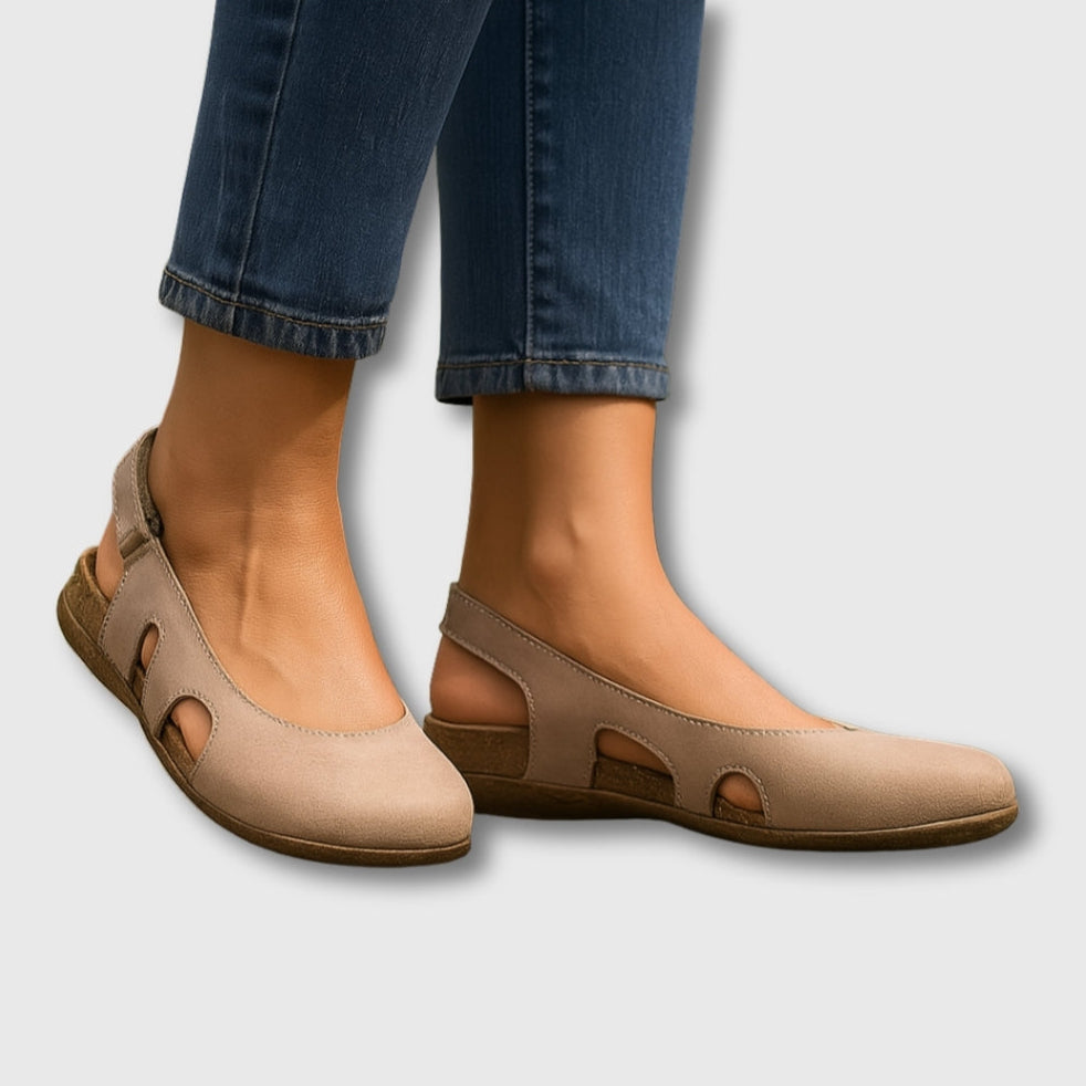 Beige comfort slip-on shoes with cutout sides and low wedge heel