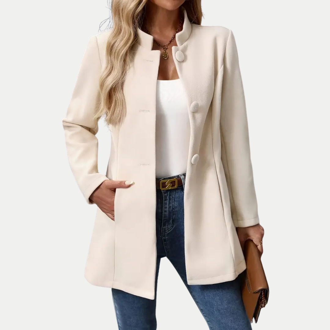 Cream button-front tailored coat with notch lapels and patch pockets