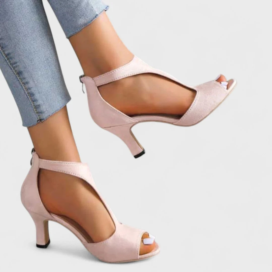 Pink orthopedic heeled sandals with open toe and side ankle straps