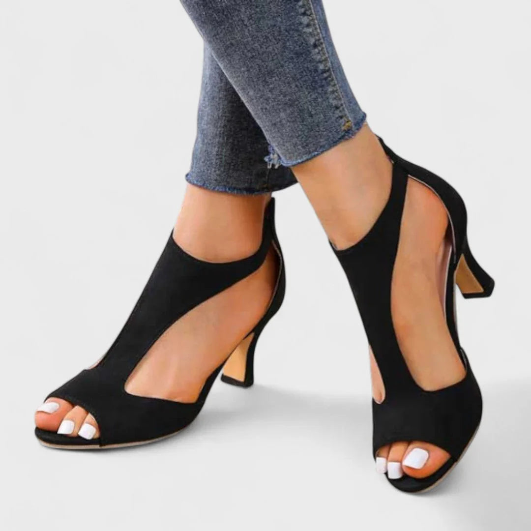 Black peep-toe heeled sandals with ankle strap and slim block heel