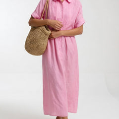 Pink shirt dress with short sleeves, button front, and gathered waist, midi length