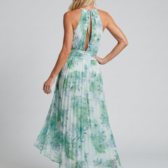 Green floral pleated midi dress with open back and tie halter straps