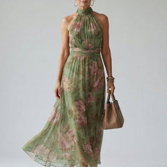 Sage green gathered halter midi dress with pink floral print, sleeveless tiered skirt