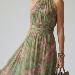 Sage green halter midi dress with pink floral print, ruched neck and gathered waist