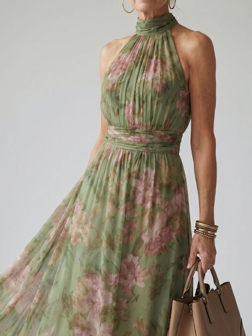 Sage green halter midi dress with pink floral print, ruched neck and gathered waist