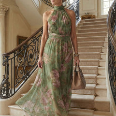 Sage green gathered halter midi dress with pink floral print, long flowing silhouette