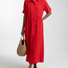 Red shirt dress with short sleeves, button front, and gathered waist, midi length