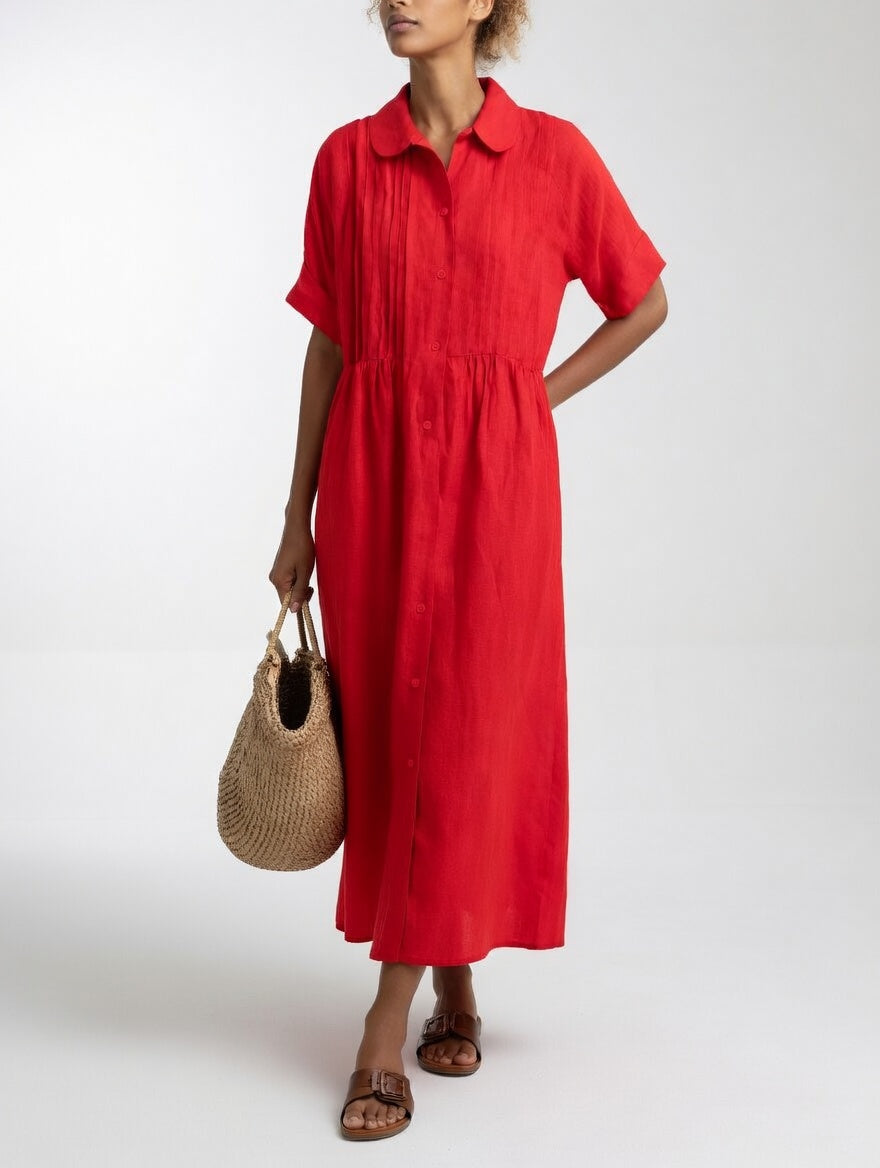 Red shirt dress with short sleeves, button front, and gathered waist, midi length