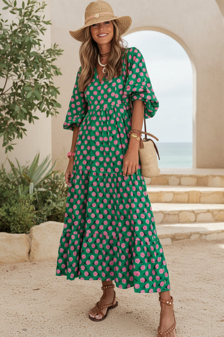 Bohemian dress in dark green with pink floral print, short sleeves, tiered maxi length