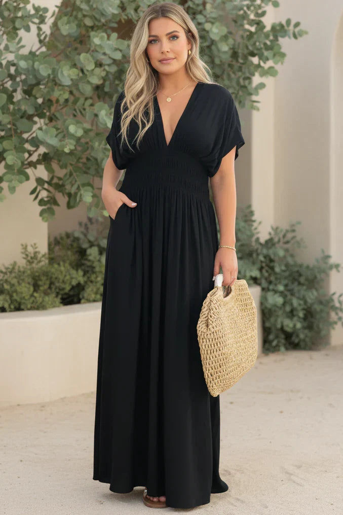 NORA light breeze dress in onyx black, V-neck maxi with short sleeves, smocked waist, side slit.