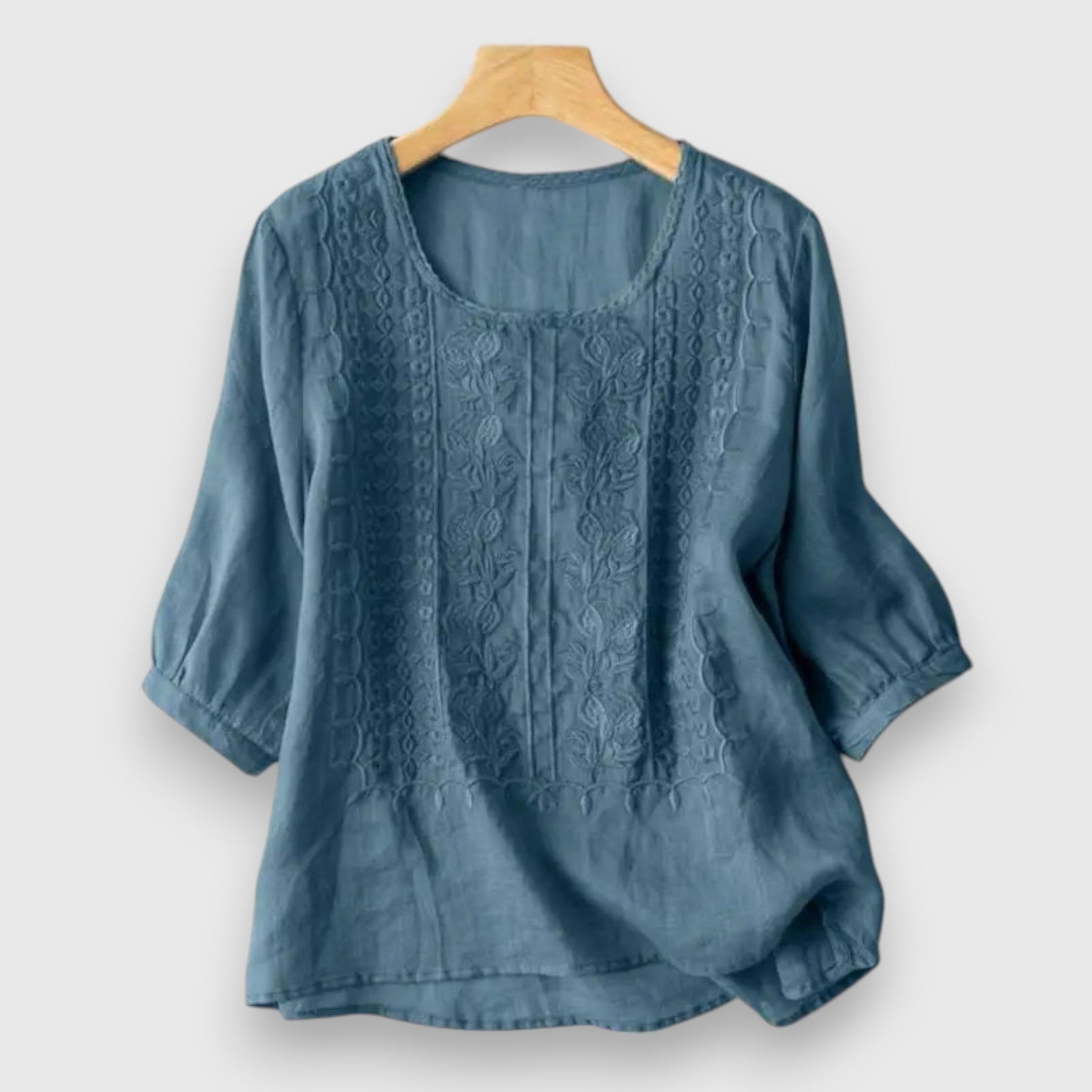 Blue embroidered blouse shirt with elbow sleeves and round neckline
