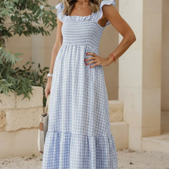 Sky blue gingham ruffle dress with cap sleeves, smocked bodice, tiered skirt