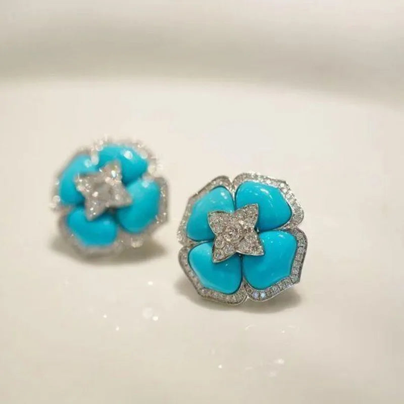 Turquoise flower stud earrings, silver-tone prong sparkle star on blue enamel petals