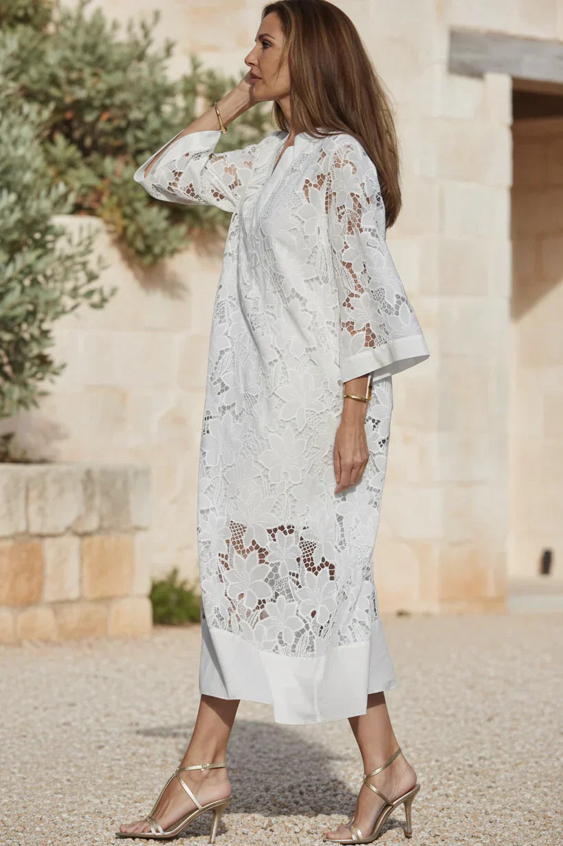 Ivory lace midi dress with V-neck and floral lace paneling, knee-length hem