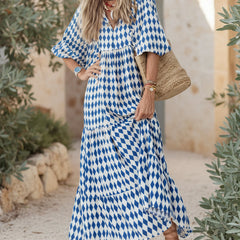 Bohemian dress in blue and white diamond print, short sleeves, tiered maxi hem