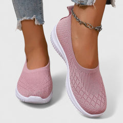 Pink knit slip-on sneakers with white sole and ankle chain detail