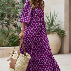Bohemian dress in purple with white floral print, long tiered skirt, puff sleeves