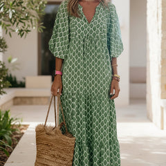 Bohemian dress in green with white lattice pattern, short puff sleeves, maxi length