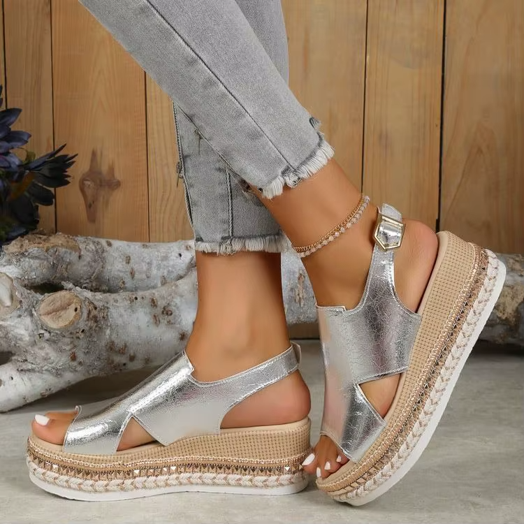 Silver metallic open-toe platform sandals with ankle strap buckle and braided sole edge