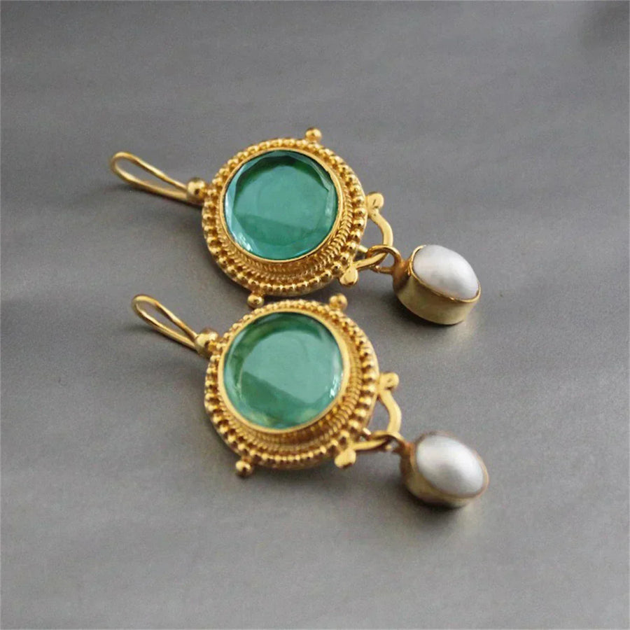 Gold-tone turquoise gem drop earrings with round green cabochon and white pearl dangles