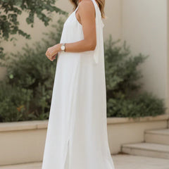 Ivory relaxed maxi dress, sleeveless with thin straps and draped skirt