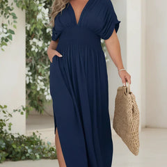 NORA light breeze dress in navy, V-neck maxi, short sleeves, smocked waist, side slit.
