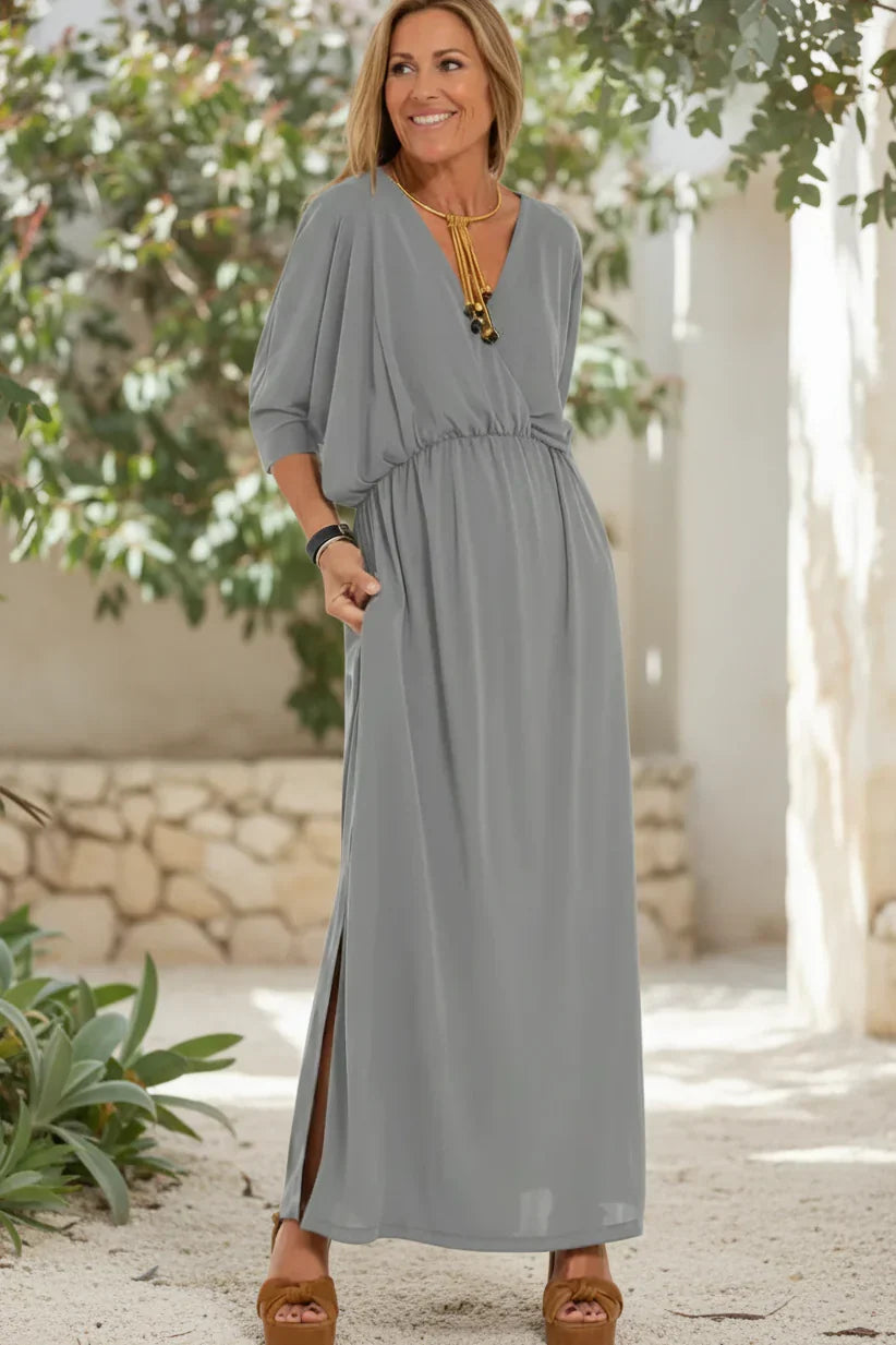 Light gray long maxi dress with gathered waist, 3/4 sleeves, scoop neck, side slit