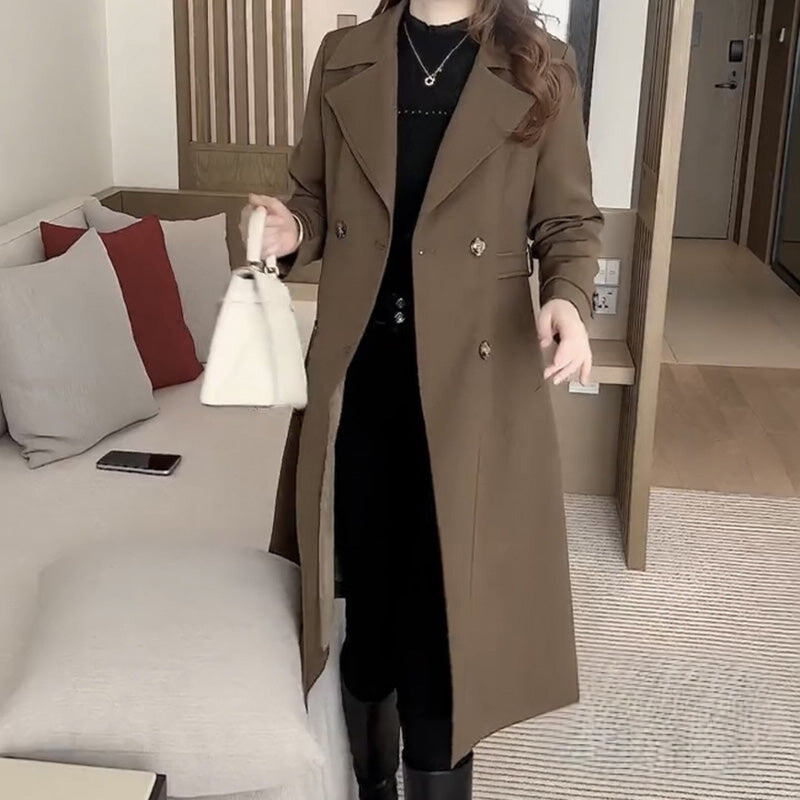 Khaki long trench coat with notch lapels, double-breasted buttons, and belted waist