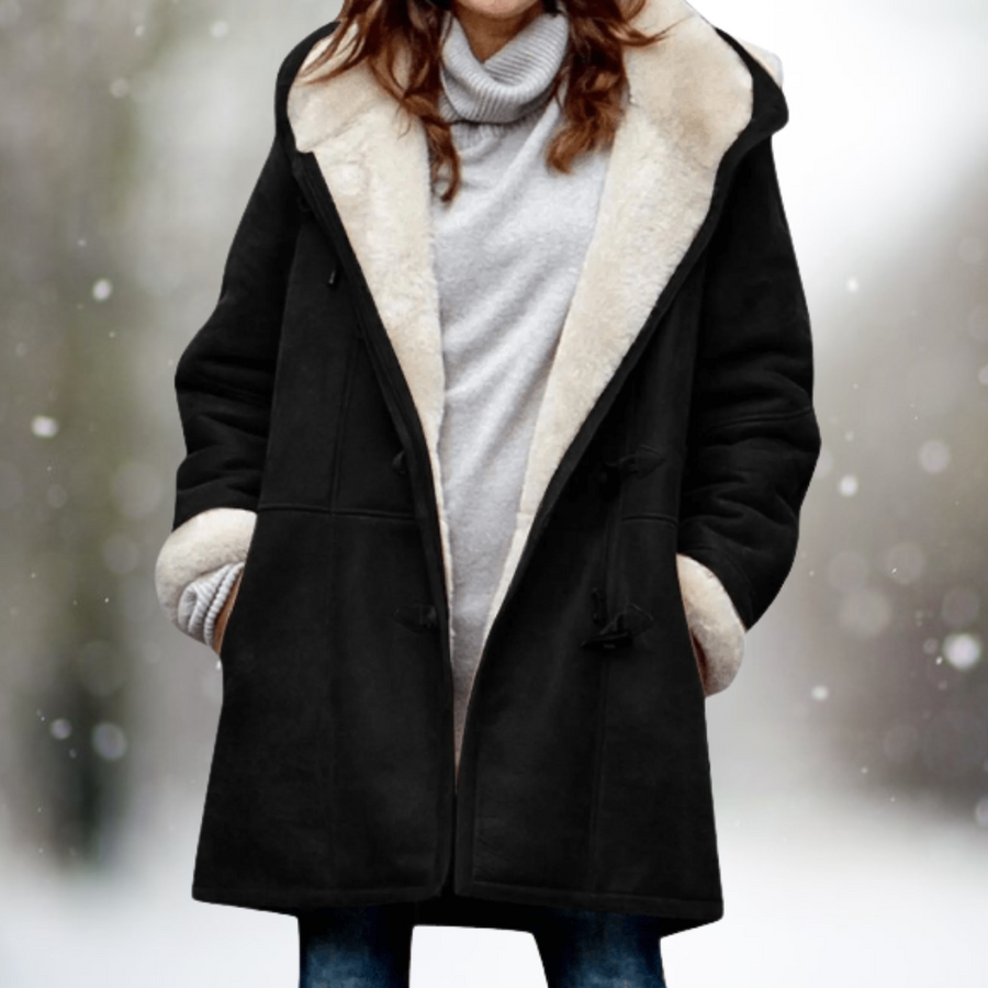 Black shearling coat with light shearling collar trim, toggle closures, long sleeves