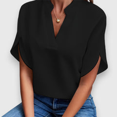 Black V-neck short-sleeve blouse with draped sleeves and relaxed fit
