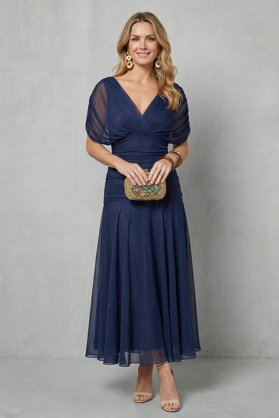 Dark blue draped off-shoulder maxi dress with ruched bodice and flowy chiffon skirt