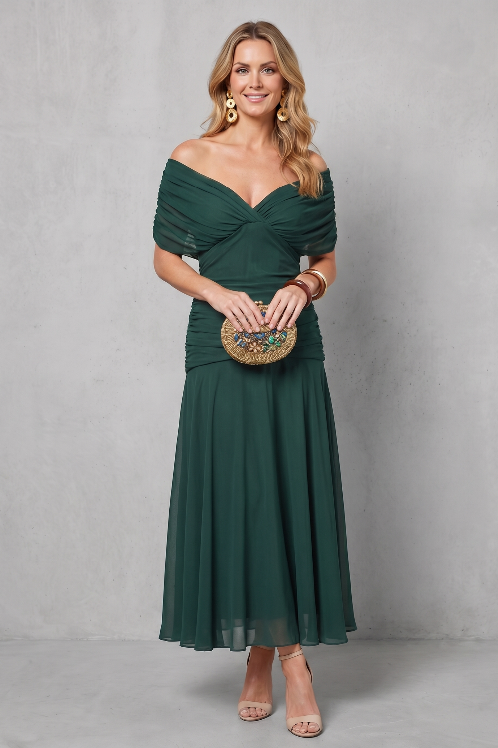 Green draped off-shoulder maxi dress with ruched bodice and flowing chiffon skirt