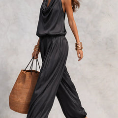 Black sleeveless draped cowl-neck two-piece with billowy gathered maxi skirt