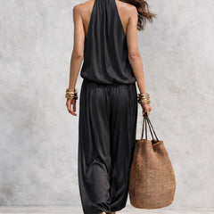 Black two-piece set with racerback draped cowl top and gathered maxi skirt
