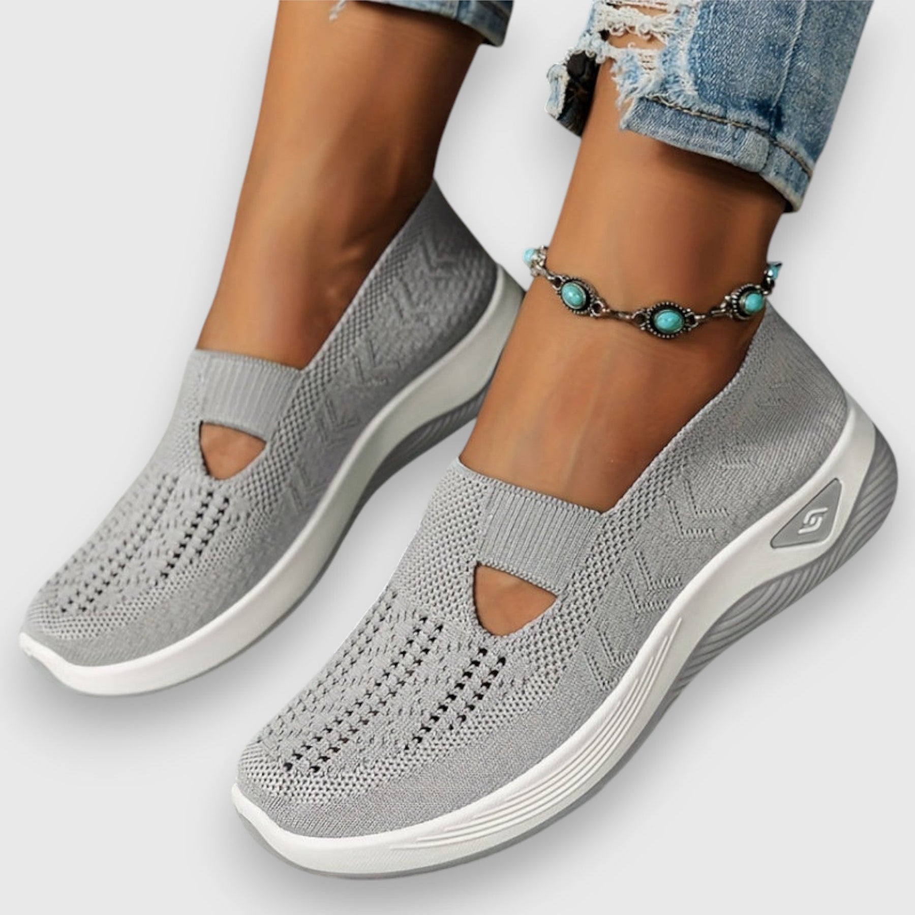 Light grey comfort slip-on sneakers with toe cutout and elastic collar