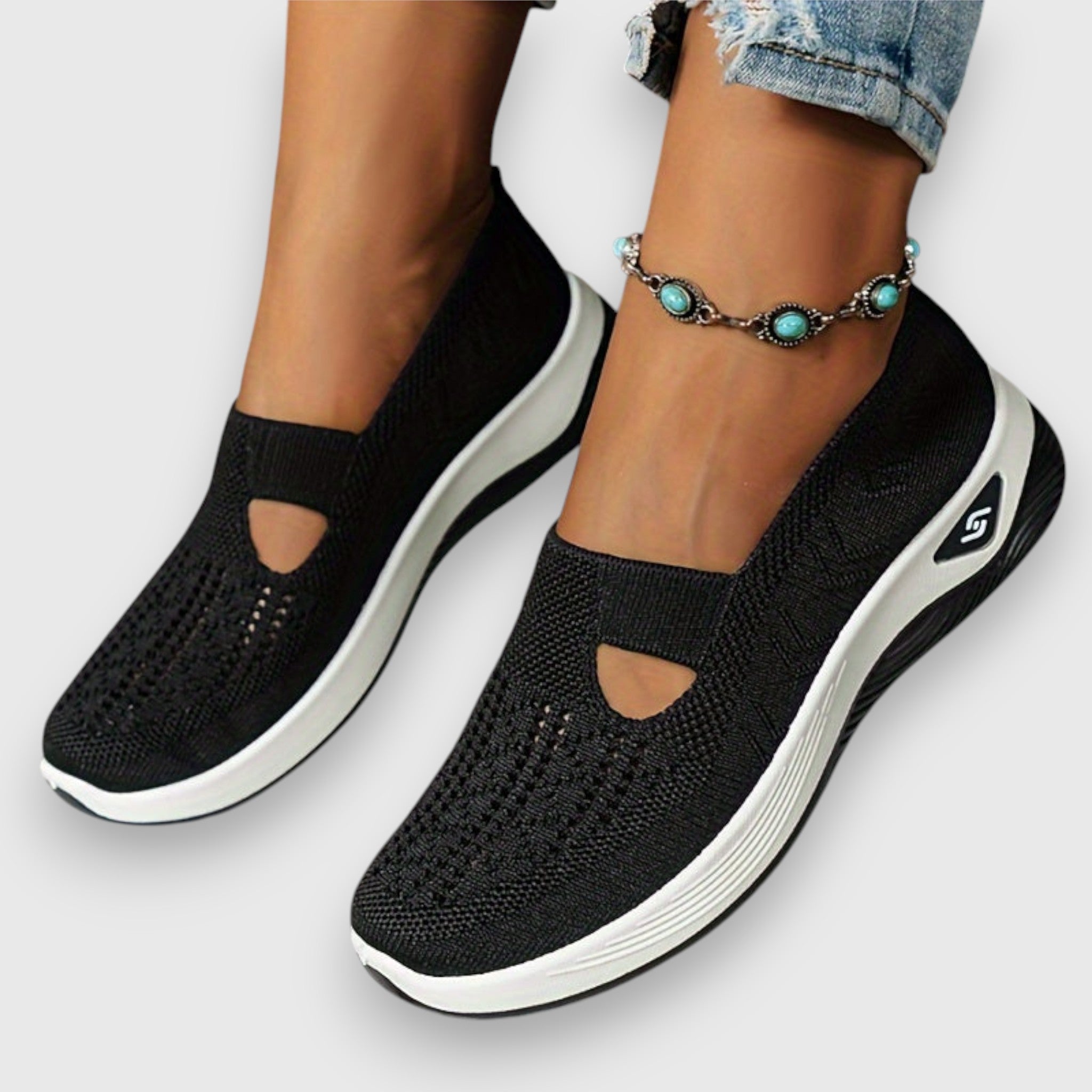 Black knit comfort slip-on sneakers with elastic gore and cutout panels