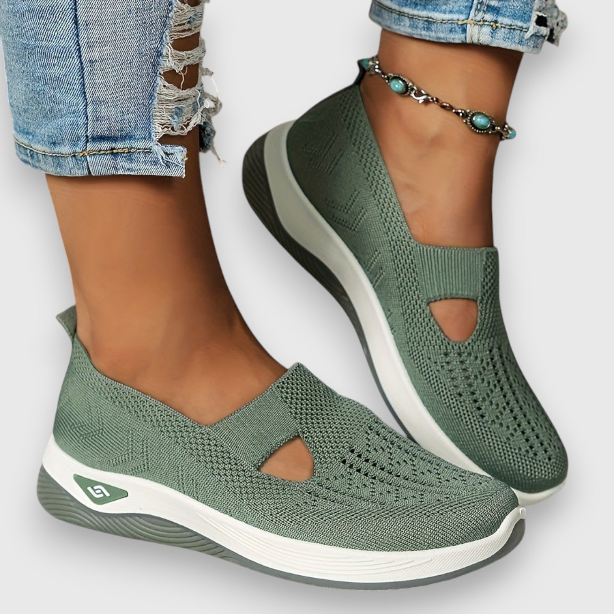 Green knit slip-on sneakers with toe cutout and stretchy sock-like fit