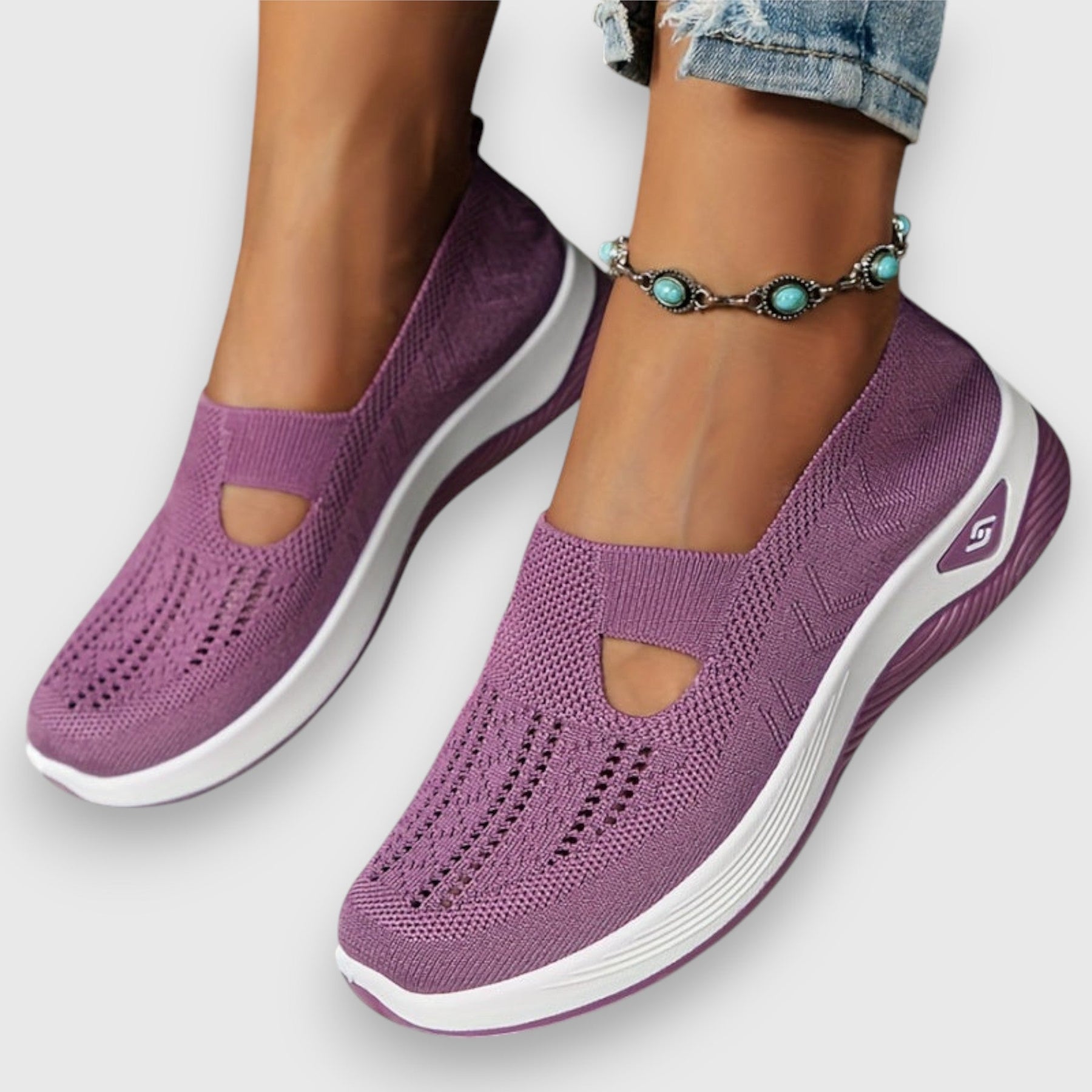 Purple knit slip-on sneakers with toe cutout and thick cushioned sole