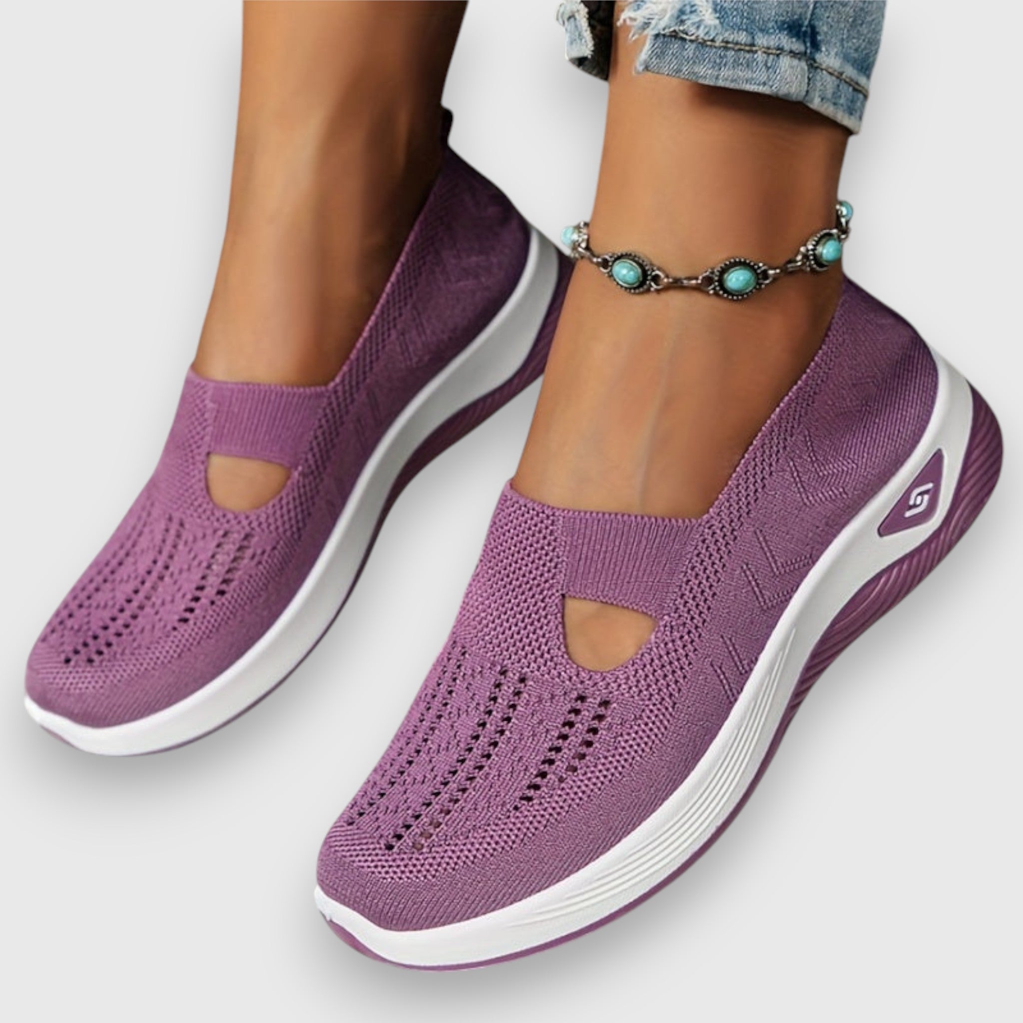 Purple knit slip-on sneakers with toe cutout and thick cushioned sole