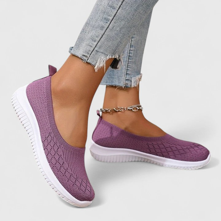 Purple knit slip-on sneakers with white sole and ankle chain detail