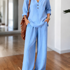 Light blue long-sleeve two-piece set with V-neck tunic top and wide-leg pants